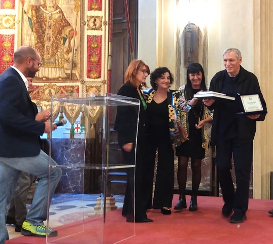 Don Ciotti al Premio Meroni copia Storia di Pio Ferrari Fracass da Pinzolo al Marcello Meroni